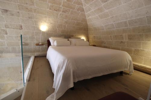 Voodi või voodid majutusasutuse Le Gioie Di Francesca toas