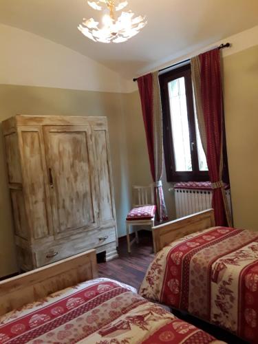 Cama o camas de una habitación en La valligiana