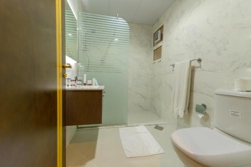Ванная комната в Downtown Plaza Hotel Apartment Pet Friendly