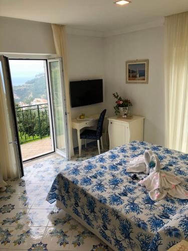 TV a/nebo společenská místnost v ubytování Nonno Francesco B&B