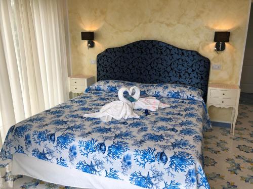 Кровать или кровати в номере Nonno Francesco B&B