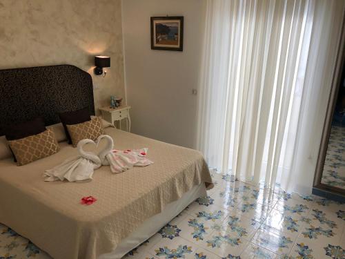 Кровать или кровати в номере Nonno Francesco B&B