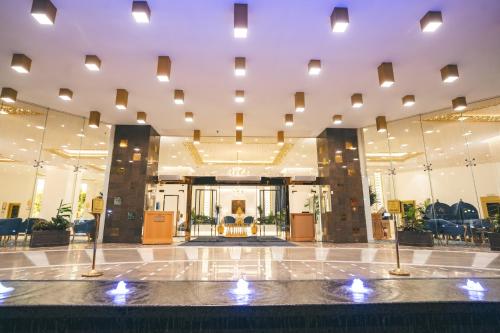 Lobi atau kawasan kaunter penerimaan di Iridium Hotel