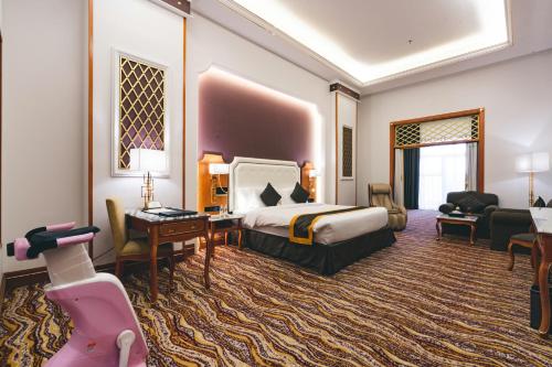 Katil atau katil-katil dalam bilik di Iridium Hotel