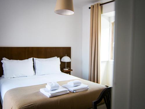 Katil atau katil-katil dalam bilik di Quinta Pedra Firme