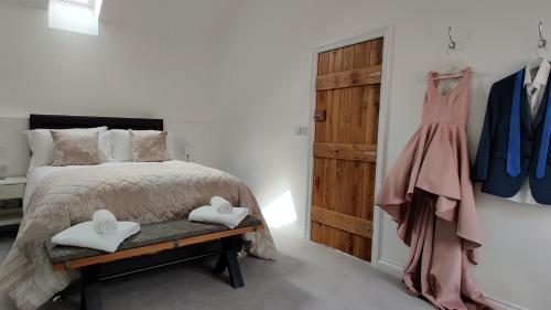 a bedroom with a bed and a closet with a dresser at The Old Bakery - 11B in Berkeley