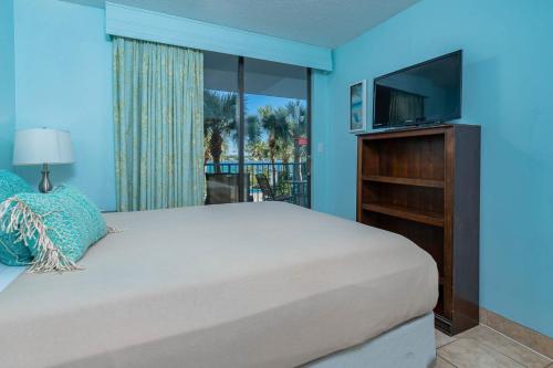 Llit o llits en una habitació de Gulf Shores Surf & Racquet Club #207A