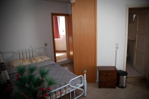 Ένα ή περισσότερα κρεβάτια σε δωμάτιο στο STAVROS amazing apartment in the centre of KOS