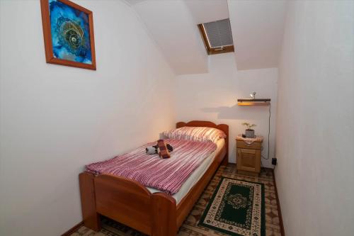 Ένα ή περισσότερα κρεβάτια σε δωμάτιο στο Apartments Orel