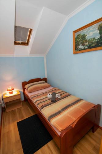 Ένα ή περισσότερα κρεβάτια σε δωμάτιο στο Apartments Orel