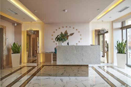 El lobby o recepción de Atmosfera Hotel