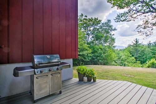 a grill on a deck next to a house at Family-Friendly Glen Home with White Mountain Views! in Glen