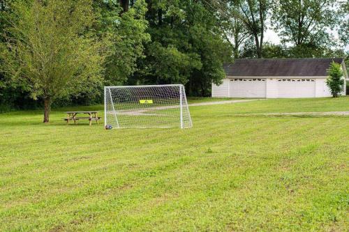 a soccer field with a goal and a picnic table at Colonial Manor in Spring Hill