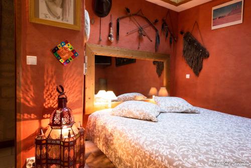 Katil atau katil-katil dalam bilik di Le Mas des Mathes, Chambres d'hôtes, Studios