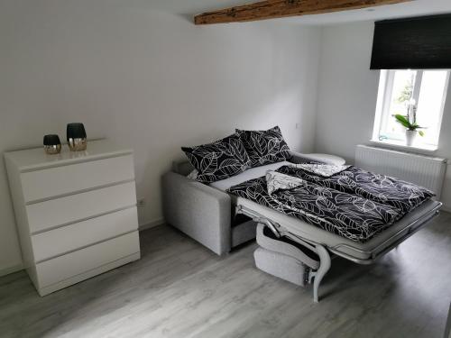 Krevet ili kreveti u jedinici u objektu Traumhaftes Apartment zentral in Bad Berleburg