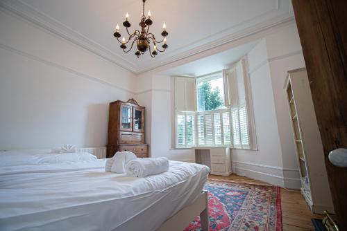 Postel nebo postele na pokoji v ubytování Carlton House