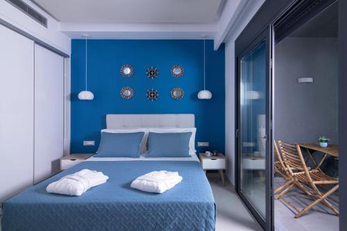 
Ένα ή περισσότερα κρεβάτια σε δωμάτιο στο Chrisanthi Villas
