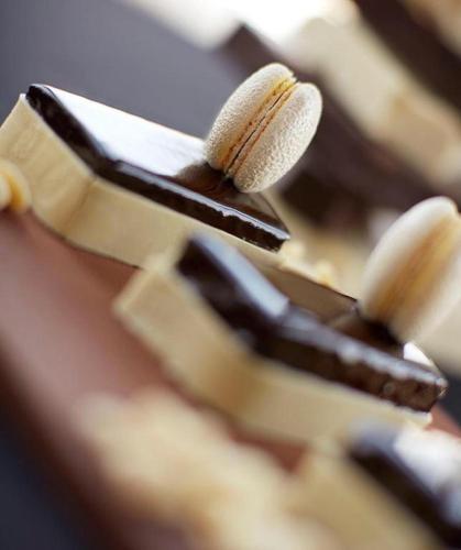 a close up of a group of chocolate desserts at Vivanta Guwahati in Guwahati