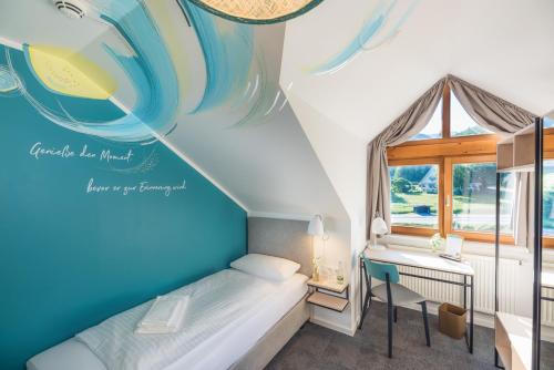 Postel nebo postele na pokoji v ubytování Hotel & Restaurant Mühlenglück