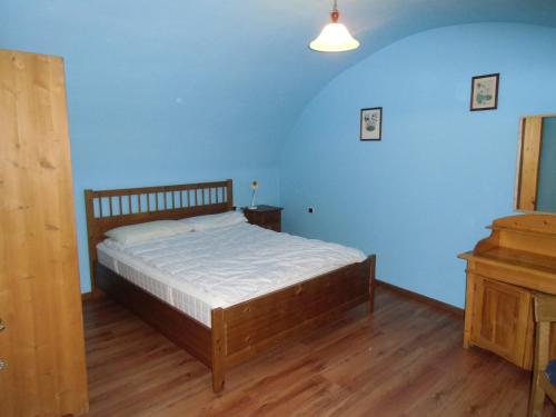Łóżko lub łóżka w pokoju w obiekcie Rio Gambis Apartment