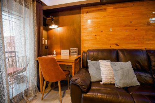 Posezení v ubytování CLOCKWORKORANGE Luxury Suites