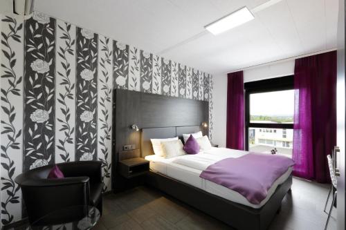 Кровать или кровати в номере Grunder Gästehaus