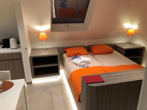 Cama o camas de una habitación en B&B wellness Sea Nat voor Naturisten