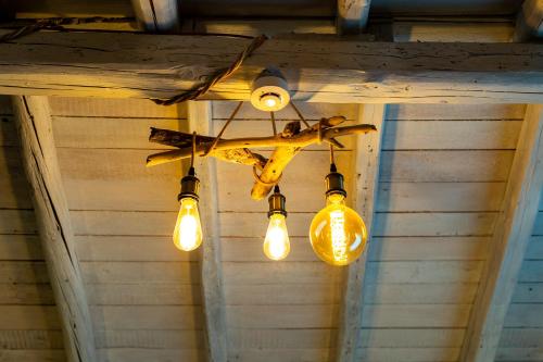a plane is hanging from a ceiling with lights at BnB Sant'Alfonso in Agrigento