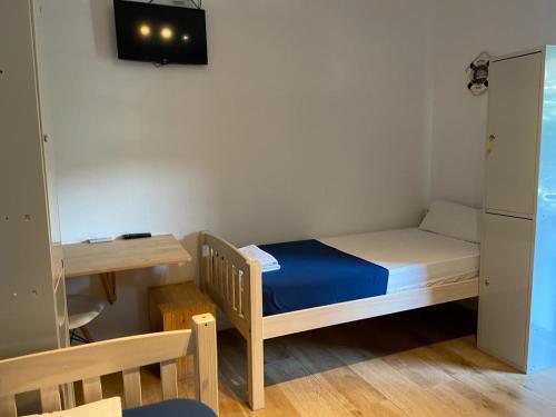 Katil atau katil-katil dalam bilik di Hostal Porto Mar