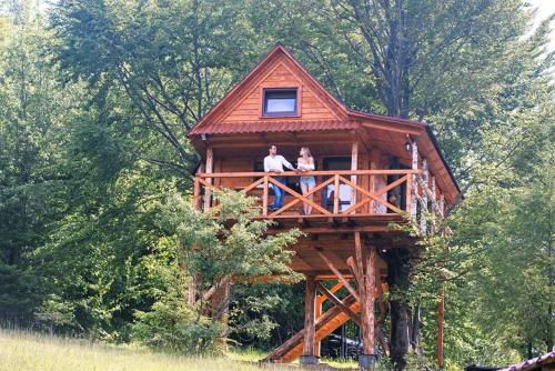 a group of people in a tree house at Rakhiv Plai in Rakhiv
