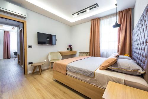 Μια τηλεόραση ή/και κέντρο ψυχαγωγίας στο Casa Antika Suites