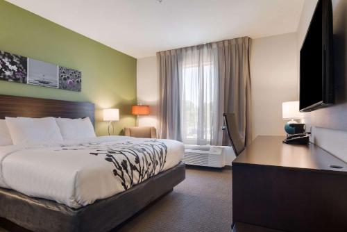 Ένα ή περισσότερα κρεβάτια σε δωμάτιο στο Sleep Inn East Camden