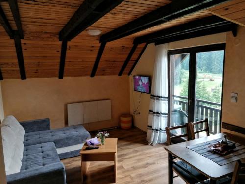 Posezení v ubytování Apartment Tarski konaci