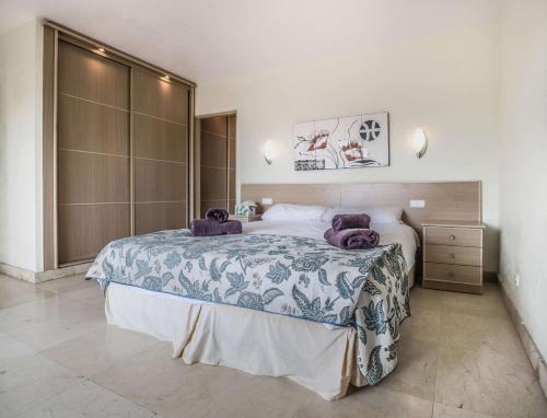 Postel nebo postele na pokoji v ubytování Espectacular Atico en Puerto Marina