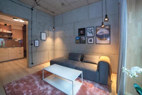Area soggiorno di Home Again Apartments Kirkegata