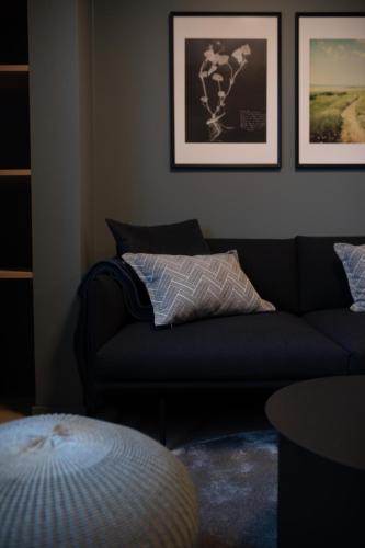 Area soggiorno di Home Again Apartments Kirkegata