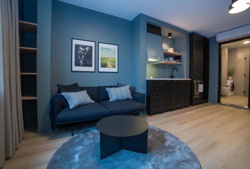 Area soggiorno di Home Again Apartments Kirkegata