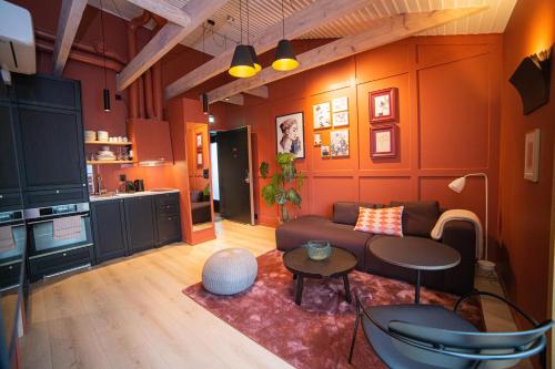 Area soggiorno di Home Again Apartments Kirkegata