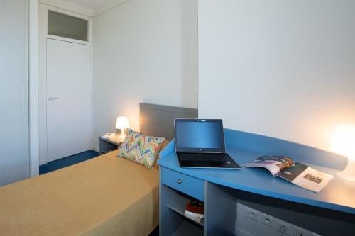 Katil atau katil-katil dalam bilik di Capucine Cosy Appart Hôtel 3 étoiles