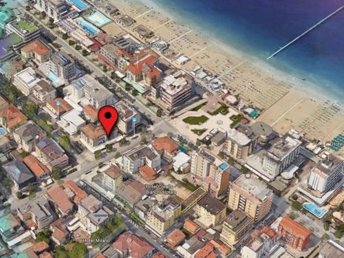 a map of a beach with a red marker at Hotel Nautic in Gatteo a Mare