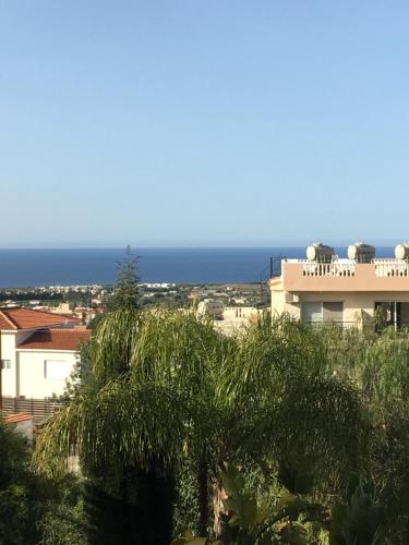 a view of the ocean from a building at Sea view Apartment Peyia, Paphos in Paphos City