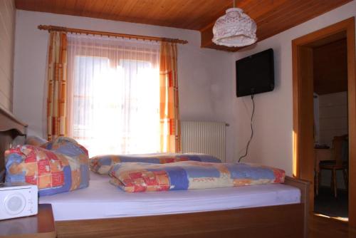 Postel nebo postele na pokoji v ubytování Ferienwohnung Bickel