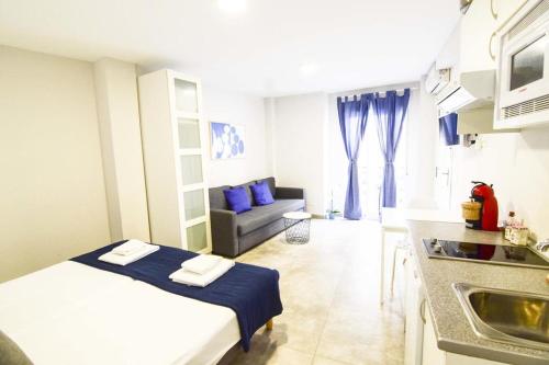 Kuchyňa alebo kuchynka v ubytovaní Apartamentos CENTRO SALECIANOS
