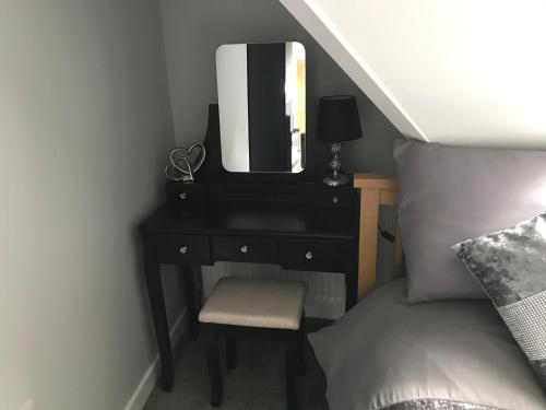 Ένα ή περισσότερα κρεβάτια σε δωμάτιο στο The spinney home stay