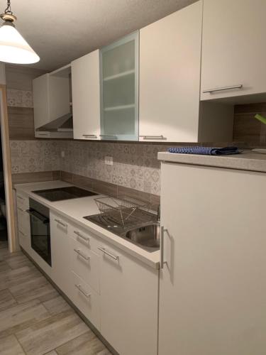Kuchyň nebo kuchyňský kout v ubytování Apartman Annamaria