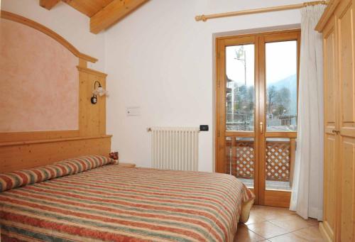 Katil atau katil-katil dalam bilik di Centro Appartamenti Vacanze