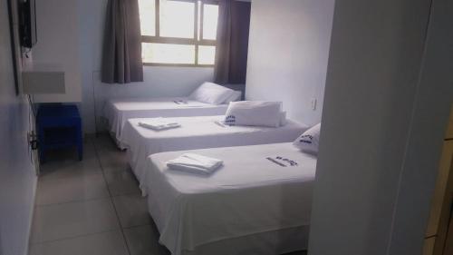 
Cama ou camas em um quarto em Hotel Serrador
