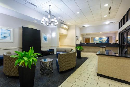 a lobby of a hospital with a waiting room at Ramada Plaza by Wyndham Virginia Beach Oceanfront in Virginia Beach
