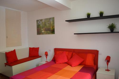 Postel nebo postele na pokoji v ubytování B&B Archi di Borgolungo