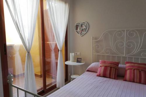 Postel nebo postele na pokoji v ubytování Relax en Manilva